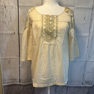 Nurture women’s top small cream with green/yellow embroidery.